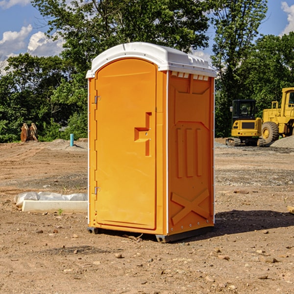 what is the cost difference between standard and deluxe portable restroom rentals in Tyro